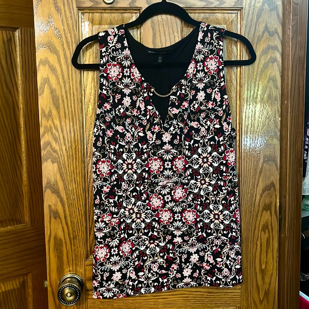 White House Black Market silky like material.